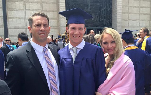 Calvin Riley at his high school graduation. The college sophomore and baseball player was shot dead Saturday night in what appears to be a horrific random attack.