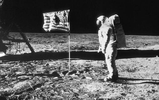 Buzz Aldrin with the American flag on the moon, July 20, 1969. 