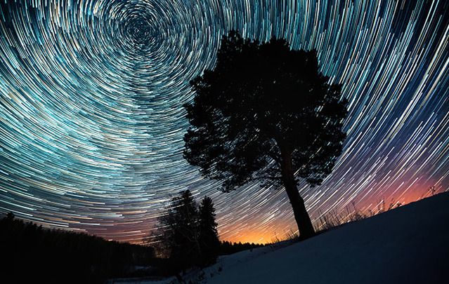 Amazing meteor shower photographed using slow exposure.