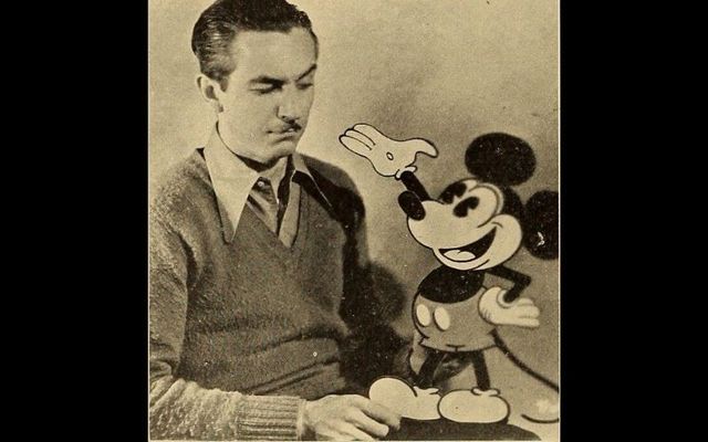  Walt Disney and his cartoon creation \"Mickey Mouse,\" from National Board of Review Magazine in October 1931.