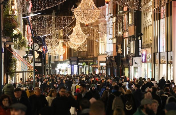 Dublin, Ireland. Pictured are the Christmas Lights shining overhead on Grafton Street last night, as people went about their Christmas shopping.