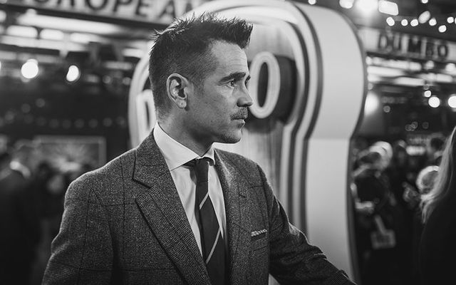 Colin Farrell poses at the premiere of \"Dumbo\".
