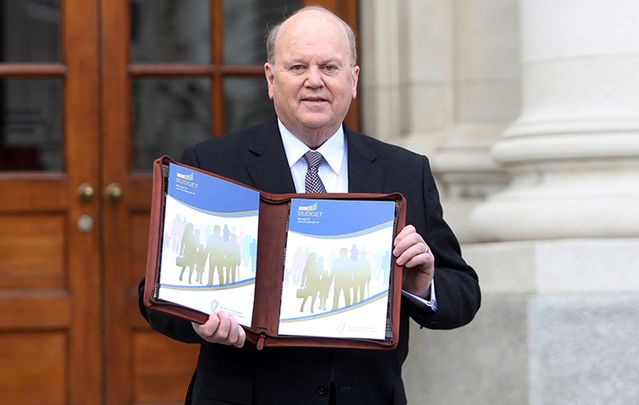 Public Expenditure and Reform Minister Brendan Howlin and Finance Minister Michael Noonan with the 2016 Irish budget.