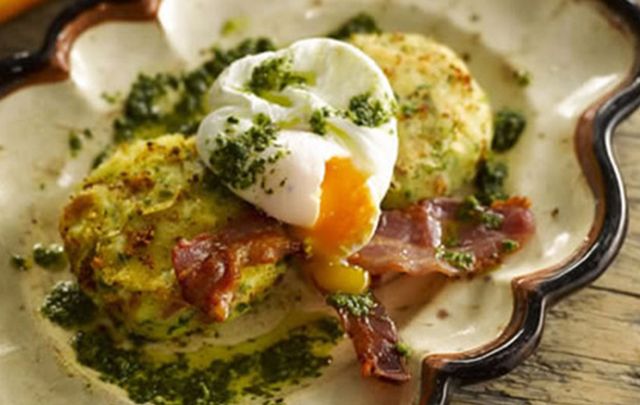 Potato cakes with bacon, eggs and mojo sauce