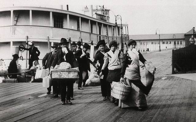 Immigrants arriving at Ellis Island. 