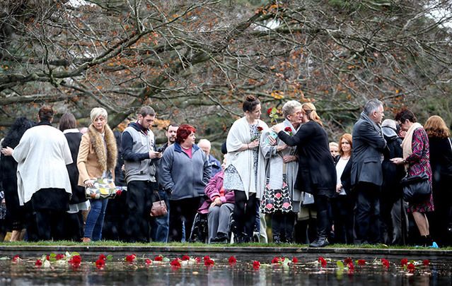 Families gather to lay roses on Ireland\'s third Missing Persons\' Day on December 2. 