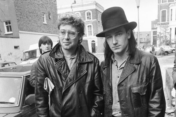 U2 stars Adam Clayton and Bono.