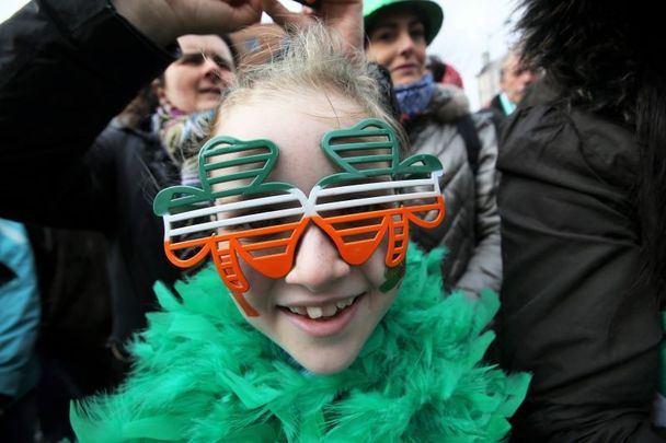 March 17, 2017:  A child from Wexford watching the St Patricks Day Parade in Dublin city.