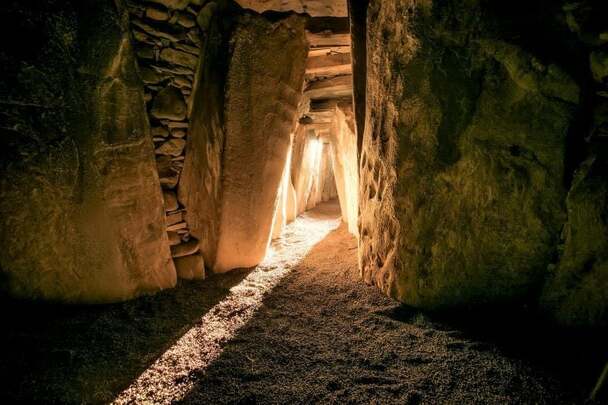 Sunlight illuminates the Newgrange monument on the day of the Winter Solstice.