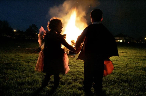 Children in Dublin gathered at a bonfire for Halloween.