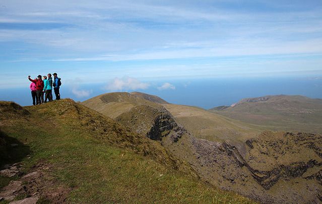 Pilgrims Path, Dingle Peninsula, Brandon Mountain: “The ancient pathway dallies along pleasant back roads and fuchsia rich lanes with many echoes from the past.”