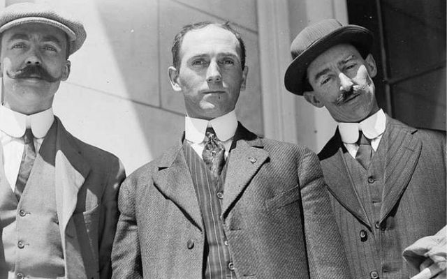 Stewards F. (Frederick) Dent Ray (1879-1977) at left and William Burke at right with another surviving crewman of the RMS Titanic, standing outside the proceedings of the American Inquiry at Washington, D.C., April 27, 1912.