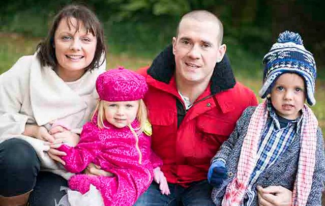 Form Irish Voice reporter April Drew with her husband John Mooney and Sadie (2) and Colum (4).