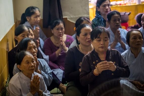 A vigil in Vietnam honoring those who died. A vigil in Vietnam honoring those who died.