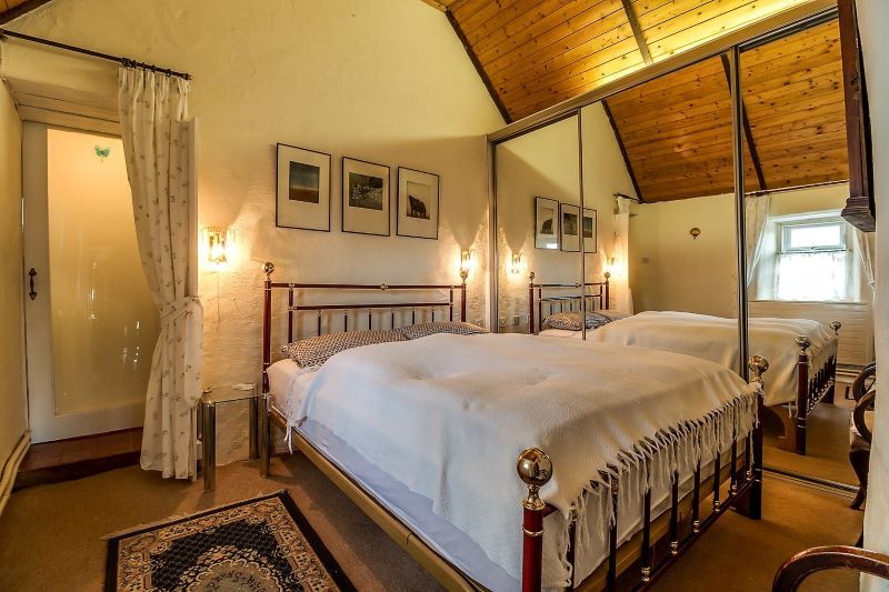One of the bedrooms in the Glenbeigh, Co Kerry thatched cottage for sale (Kerry Atlantic Homes)