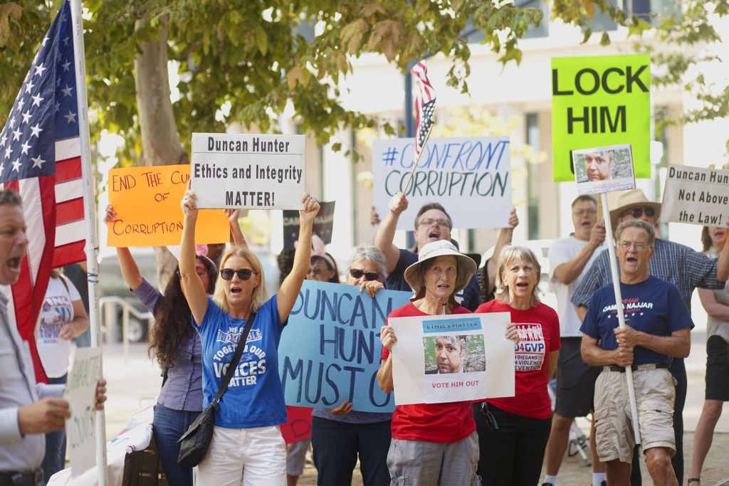 Duncan Hunter campaign funds protest. Protesters outside of the San Diego Federal Courthouse during an arraignment hearing for Congressman Duncan Hunter on Thursday, August 23, 2018 in San Diego, CA.