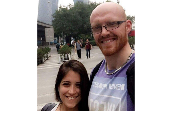 Andrew Brennan and his partner in China.