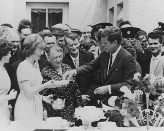 President John F Kennedy handing out cake during his 1963 visit to Ireland.