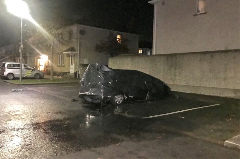 The burned-out car where Wayne Whelan's body was discovered (RollingNews.ie)