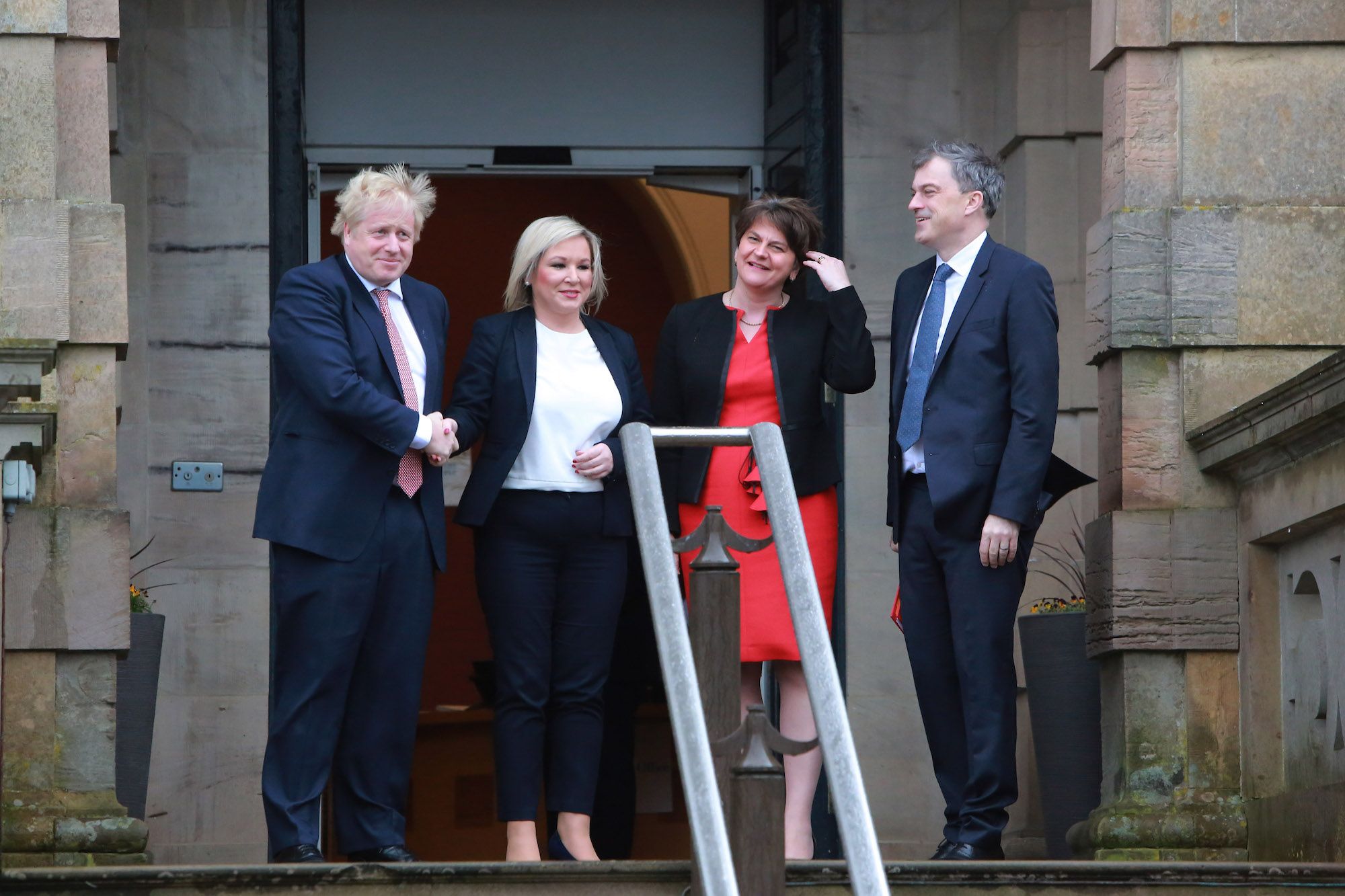 British Prime Minister Boris Johnson, Sinn Fein Deputy Leader Michellle O'Neill, DUP Leader Arlene Foster and the UK Secretary to Northern Ireland, Julian Smith.