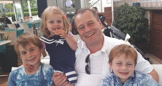 Andrew McGinley with this three children - Conor (9), Darragh (7) and Carla (3).