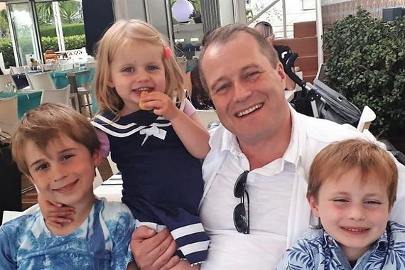 Andrew McGinley and his three children. Andrew McGinley and his three children.