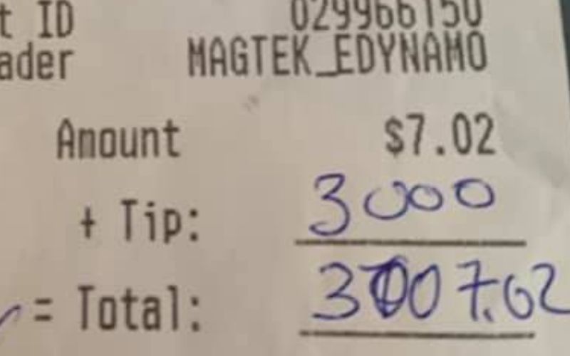 The generous customer left the huge tip on a $7 bill. The generous customer left the huge tip on a $7 bill.