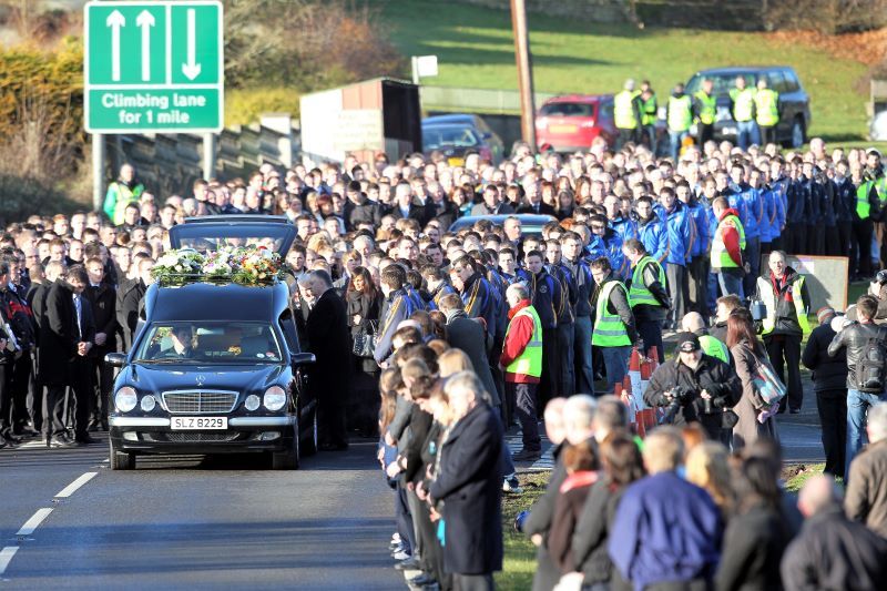 January 17, 2011: Mourners walk behide the hearse carrying the remains of Michaela McAreavey to St Malachys Church near Ballygawley in Co Tyrone. (RollingNews.ie)