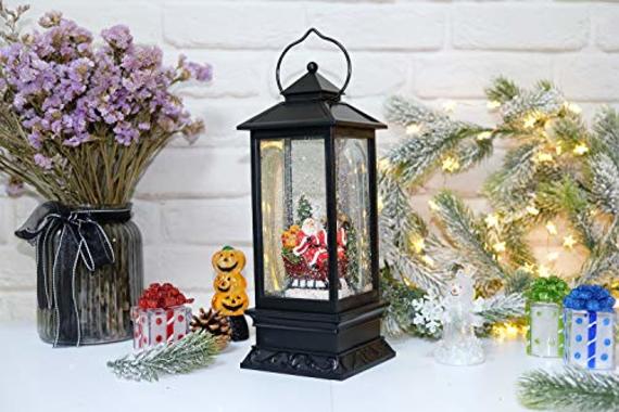 How about a sparkly Christmas snow globe featuring Santa for some extra seasonal glitter? How about a sparkly Christmas snow globe featuring Santa for some extra seasonal glitter?