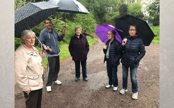 Kate’s long lost cousins Mary, Bobby, Noreen and Carmel took us on a tour of the old Village of Glenanore. Notice the umbrellas! Kate’s long lost cousins Mary, Bobby, Noreen and Carmel took us on a tour of the old Village of Glenanore. Notice the umbrellas!