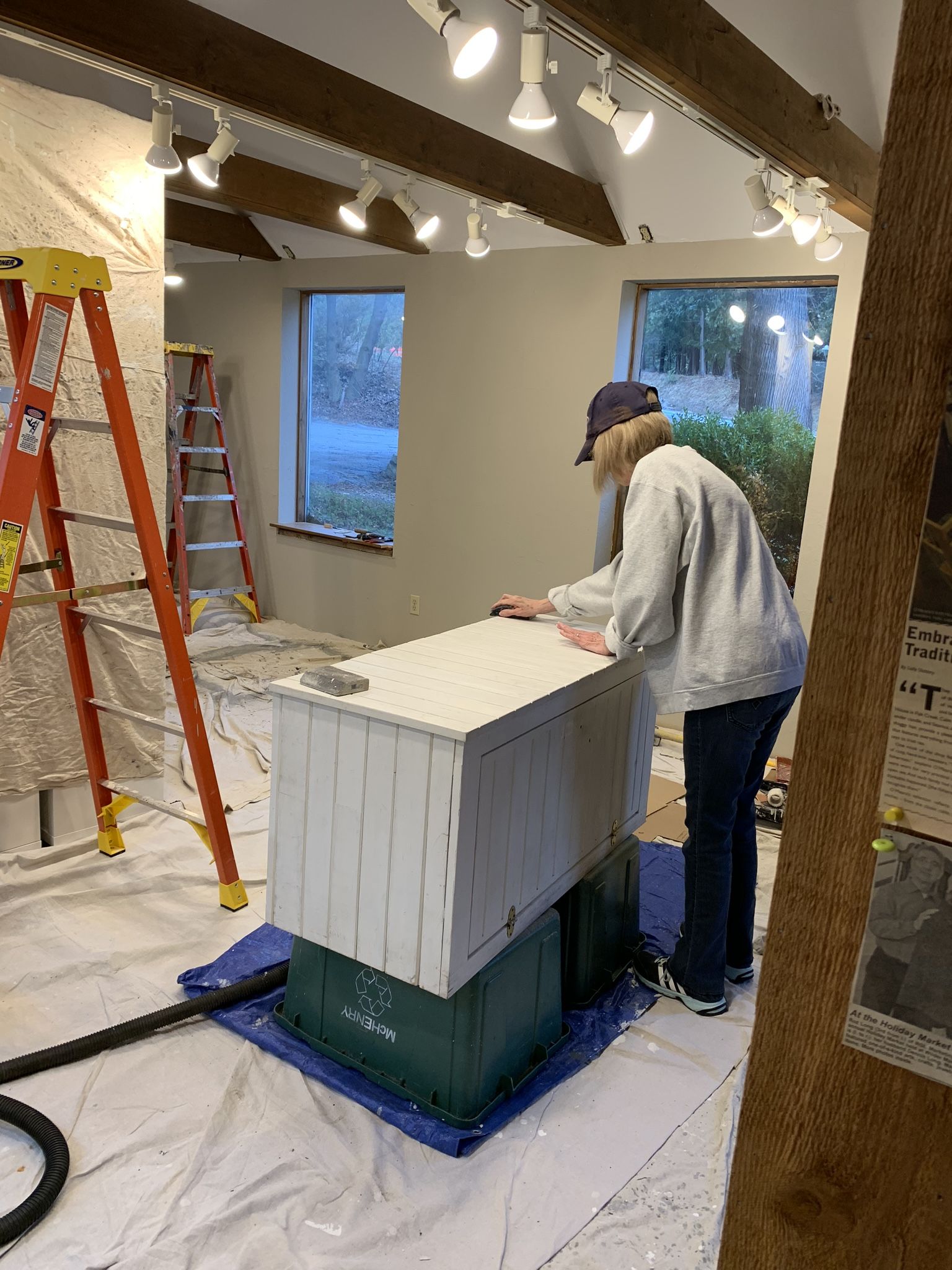 While the physical shop has been closed, Megan and her parents, Tom and Mary Jean O'Meara, have been updating the shop's Wool Room. Pictured here: Mary Jane hard at work.