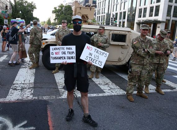 Protestor takes aim at unnamed American troops deployed against protestors Protestor takes aim at unnamed American troops deployed against protestors