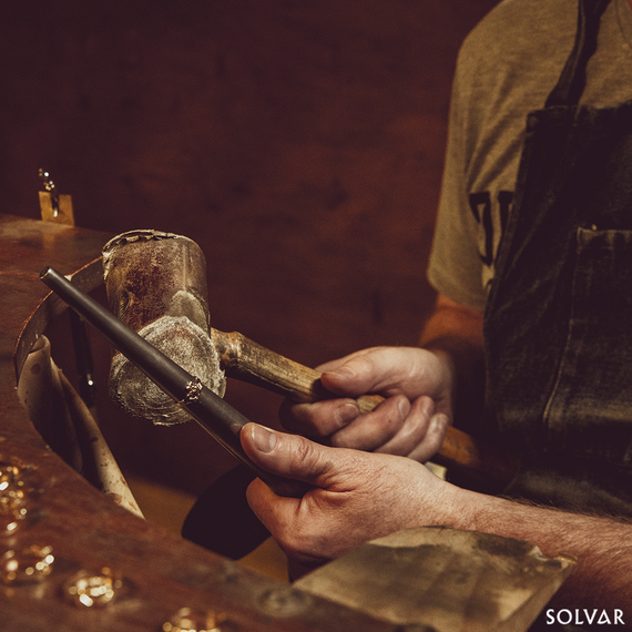 A Solvar goldsmith at work. A Solvar goldsmith at work.