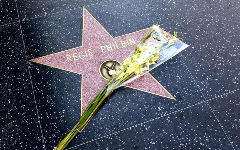Flowers placed on Regis Philbin's star on the Hollywood Walk of Fame. Credit: Getty Images