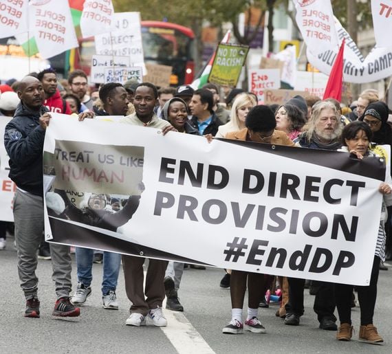 A protest in Dublin, in 2018, to end Direct Provision. A protest in Dublin, in 2018, to end Direct Provision.