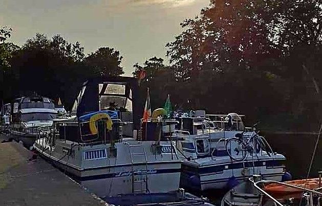 Jean Farrell on her own boat on the River Shannon. Jean Farrell on her own boat on the River Shannon.
