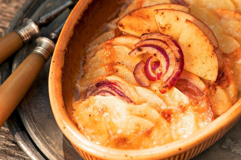 Potato gratin with apples and red onions. (Getty Images)
