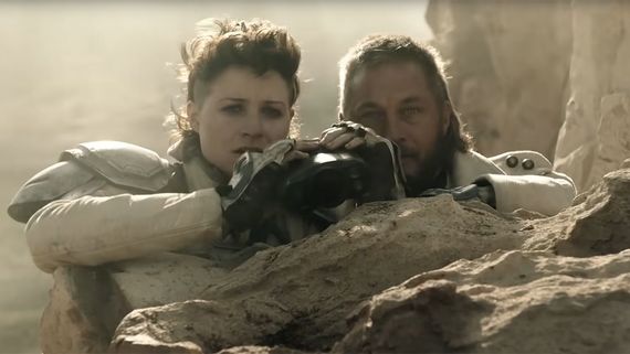 Niamh Algar and Travis Fimmel in "Raised By Wolves" on HBO Max Niamh Algar and Travis Fimmel in "Raised By Wolves" on HBO Max
