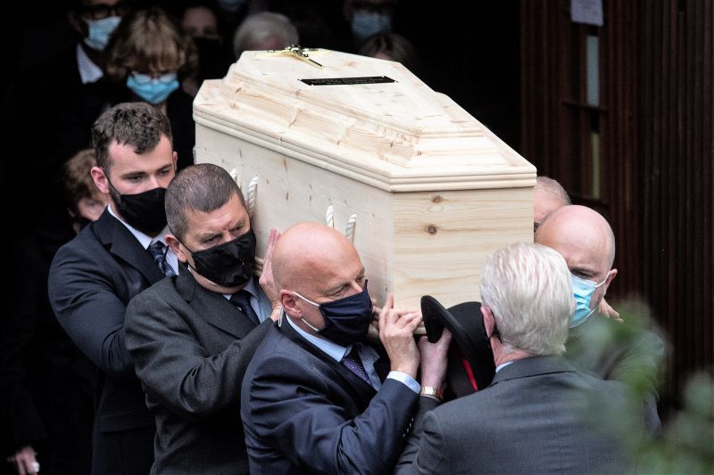 October 15, 2021: Family members carry the coffin from St Kevins Church in Glendalough, Co. Wicklow after the funeral of Paddy Moloney. (RollingNews.ie)