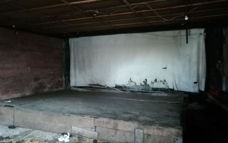 The original seating, stage and screen are still inside the cinema and forms part of the property for sale The original seating, stage and screen are still inside the cinema and forms part of the property for sale