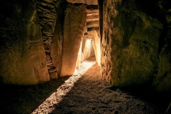 The chamber at Newgrange, County Meath, on the morning of the winter solstice. The chamber at Newgrange, County Meath, on the morning of the winter solstice.