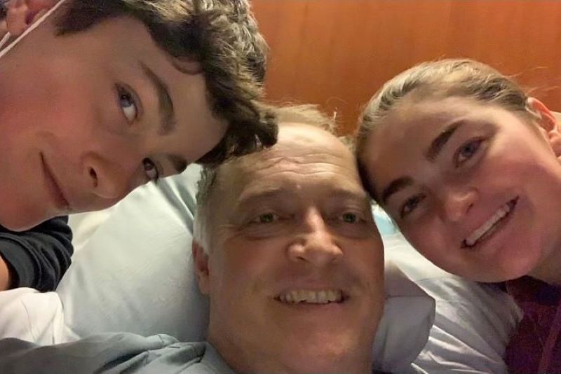 Bertie recovering with his children Aidan and Catie.