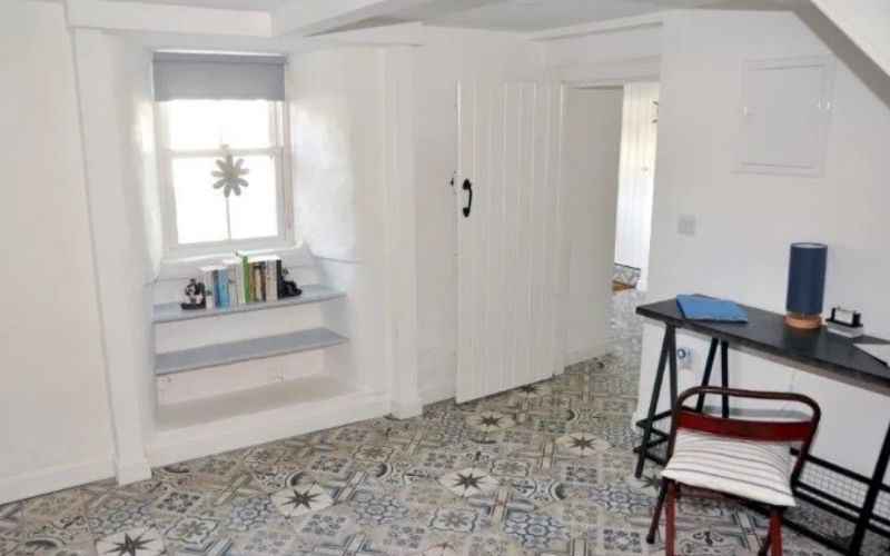 The home is set on easy-maintenance grounds with an enclosed yard for private parking The home is set on easy-maintenance grounds with an enclosed yard for private parking