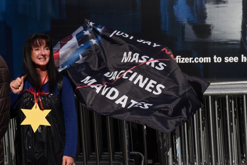 November 13, 2021: People against vaccinating for the COVID-19 virus protest in front of Pfizer world headquarters in New York City. (Getty Images)