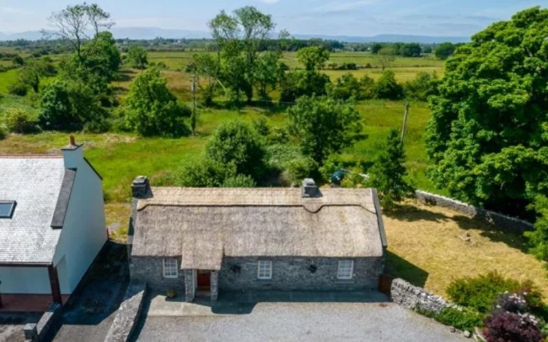 This picture-perfect, period cottage known as "The Thatch" This picture-perfect, period cottage known as "The Thatch"