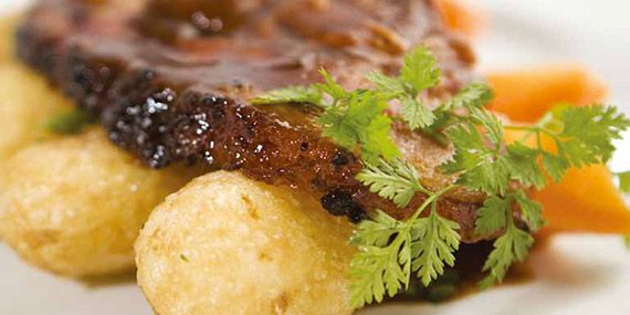 Pork loin braised in Guinness with roast potatoes. Pork loin braised in Guinness with roast potatoes.