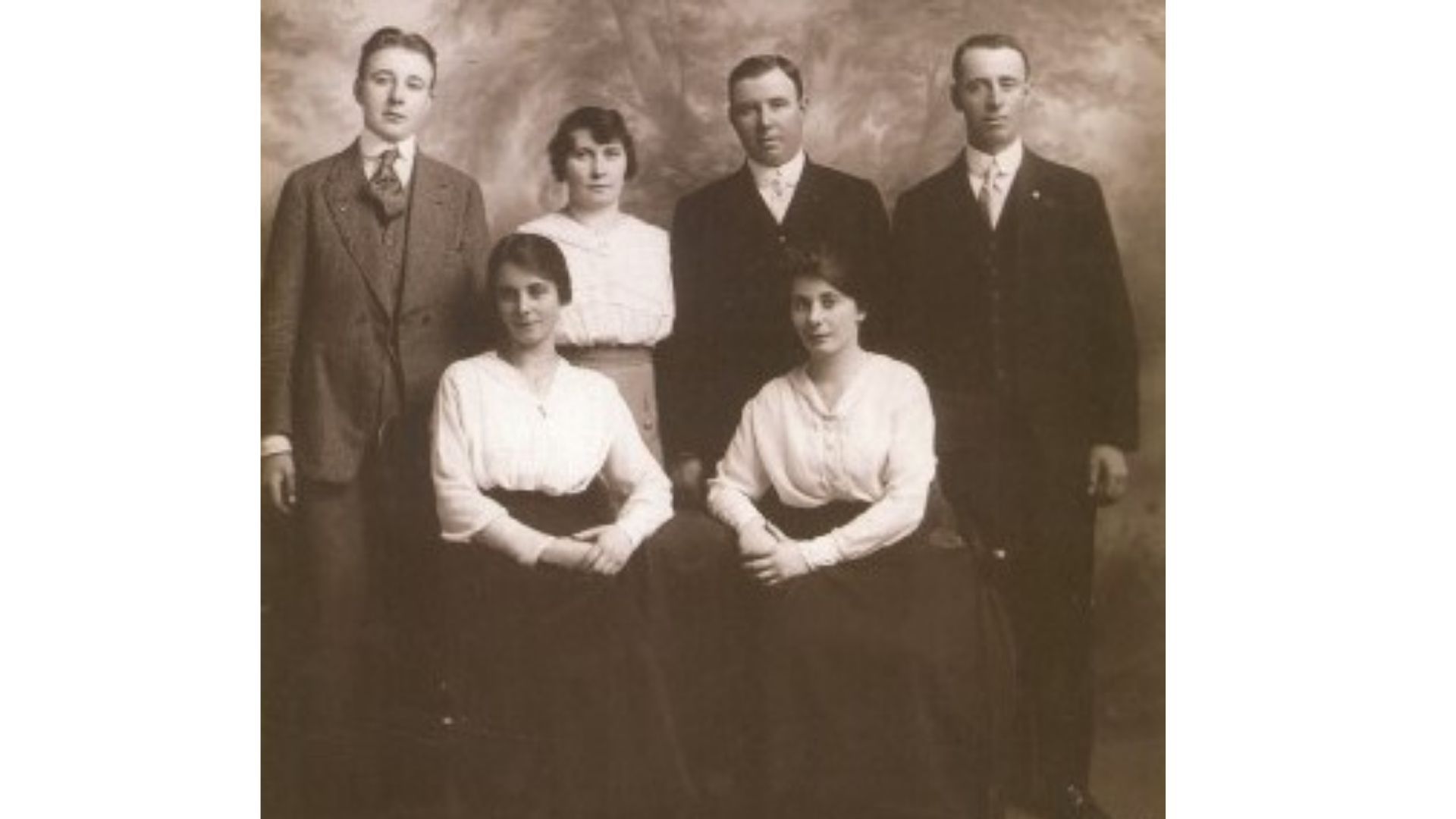 Margaret Martin, from left, with her sister Celia (Noone). Back row, from left, her brother Jim Martin, Delia (McHugh) Martin and husband Pat, Owen Martin Margaret Martin, from left, with her sister Celia (Noone). Back row, from left, her brother Jim Martin, Delia (McHugh) Martin and husband Pat, Owen Martin