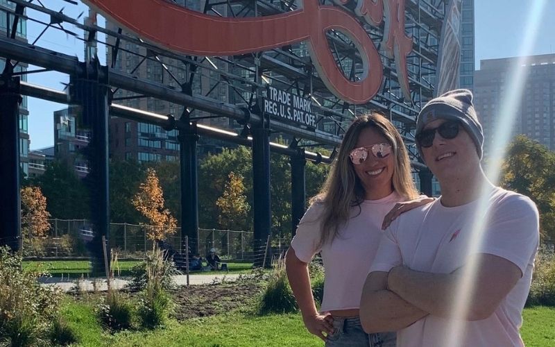 Shane Kenny and Sarah Pleitez at the Pepsi Cola sign in Long Island City.