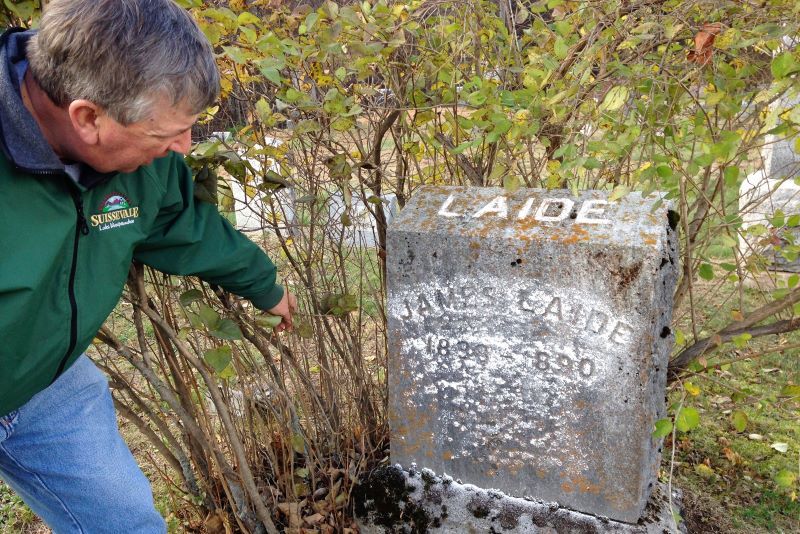 Mike’s 2nd great grandfather’s gravestone was lost in time behind overgrown shrubs until discovered by Kate.