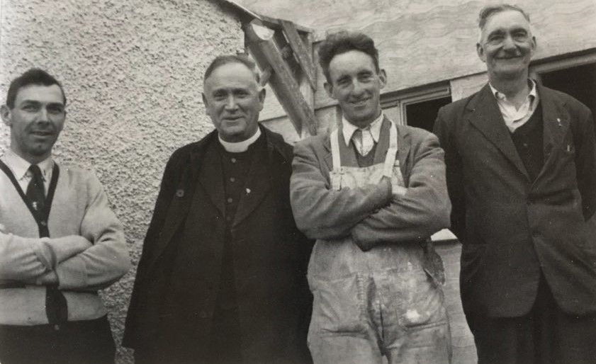 Canon Hayes checking out new houses under construction in Bansha, Co. Tipperary, with Eddie McCarthy, Mikey Morrissey and Ned Hanly.